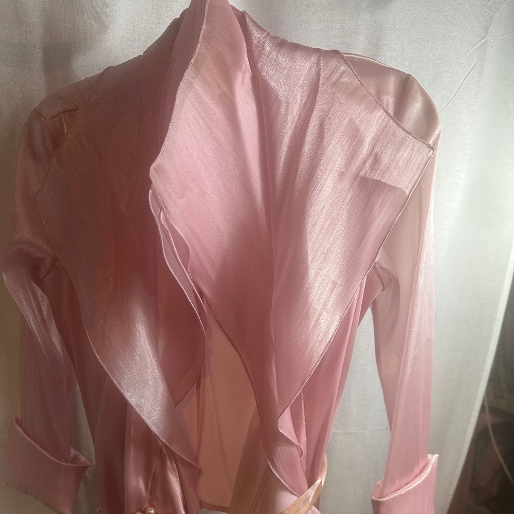 Pink blouse with pearl belt accent